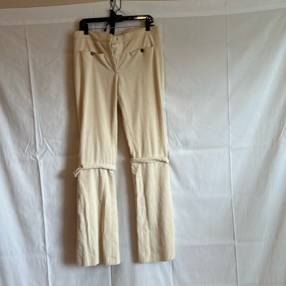 CHANEL CREAM CORDUROY PANTS WITH LEG BUCKLES. Size 42.